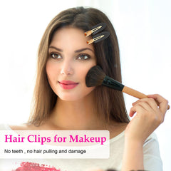 D clips in use during makeup application keeping hair away from face for easier application