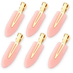 D brand clip front view showing pink body and golden handle, professional aesthetic