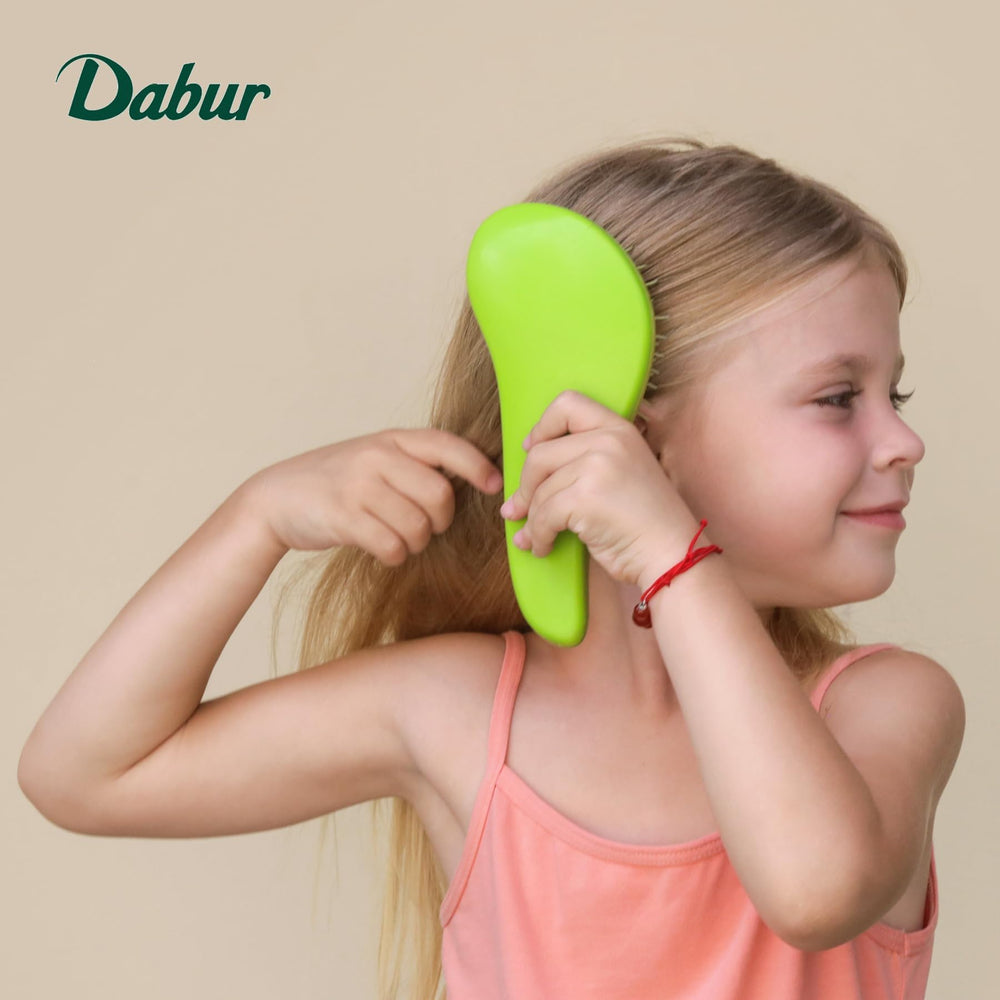Dabur amla olive almond ingredients display emphasizing natural botanical blend