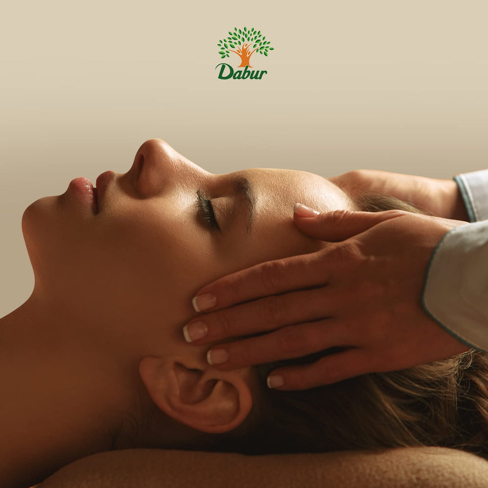 Dabur Kachi Ghani 1L bottle beside common items indicating size convenience