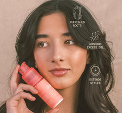 DAE lifestyle bathroom scene conveying convenient, on-the-go hair refresh benefits