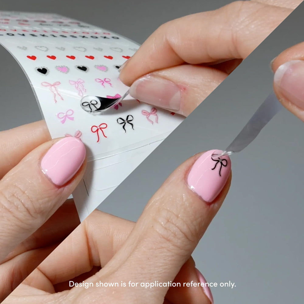 Dashing Diva hand holding stickers to show scale and quantity for planning full-set designs