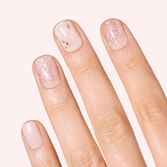 Dashing Diva close-up of marbling and rose gold glitter strips highlighting glossy detail