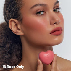 dasique cheek application on model demonstrating natural flush