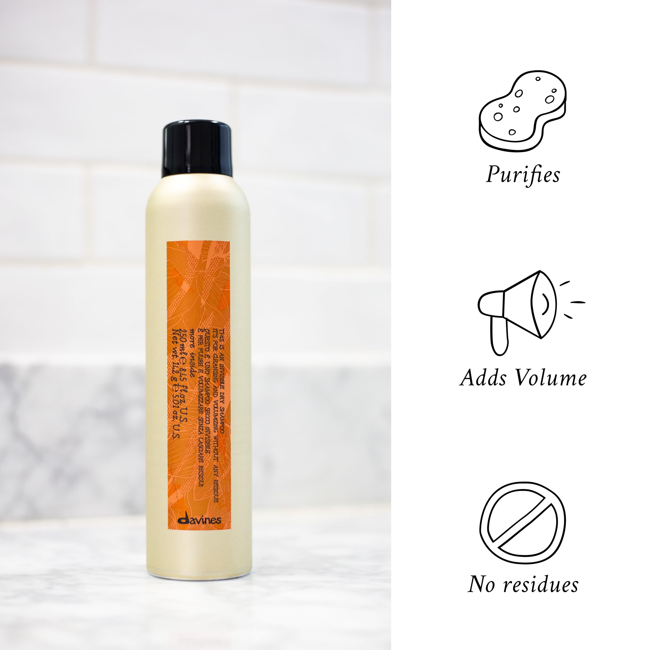 Davines bottle in hand for size comparison and travel-ready benefit