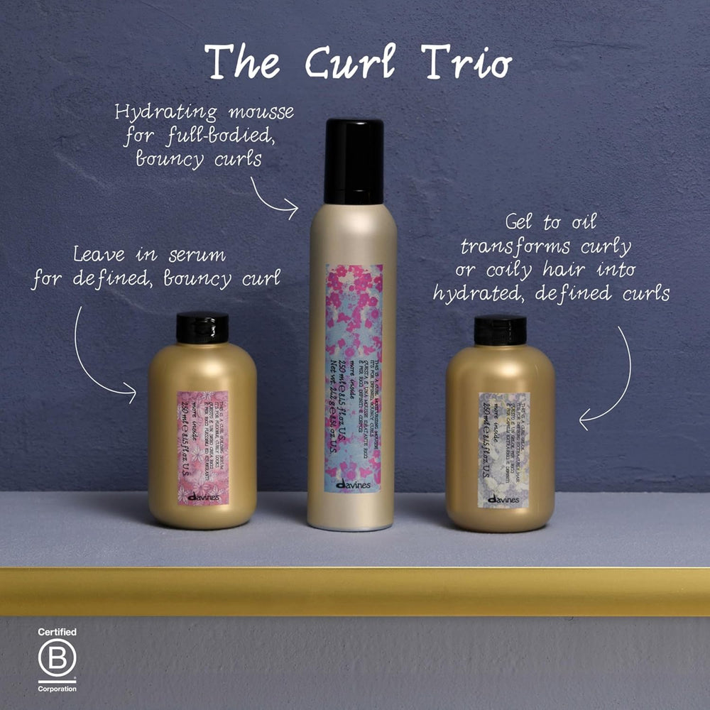 Davines styled hair after treatment showing shiny, frizz-reduced curls