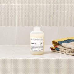Davines lather demo on wet hair, visible foam demonstrating effective yet mild cleansing