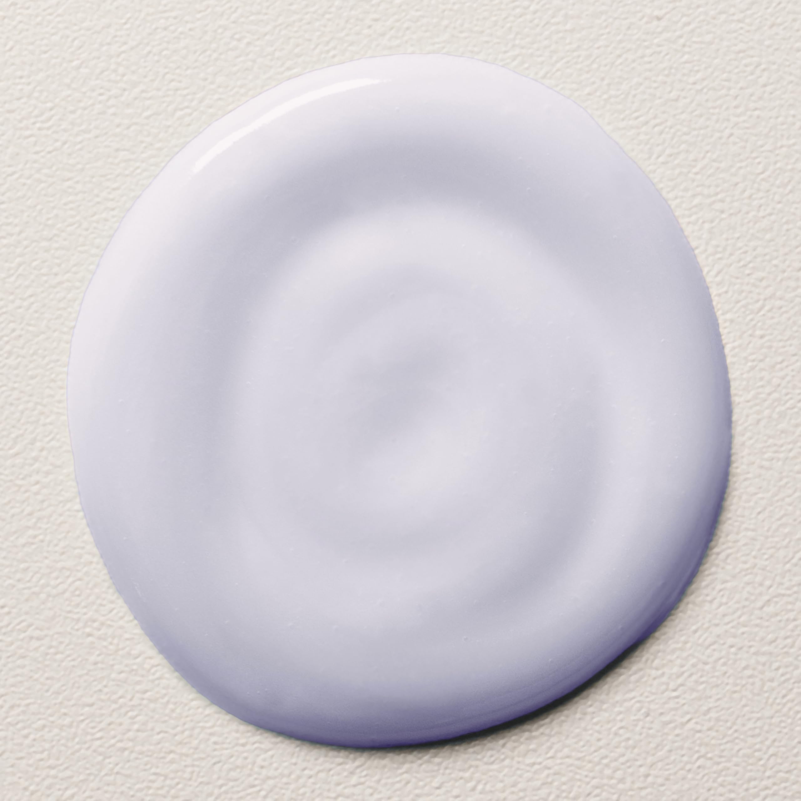 Davines serum texture on hand highlighting creamy absorbent formula benefits