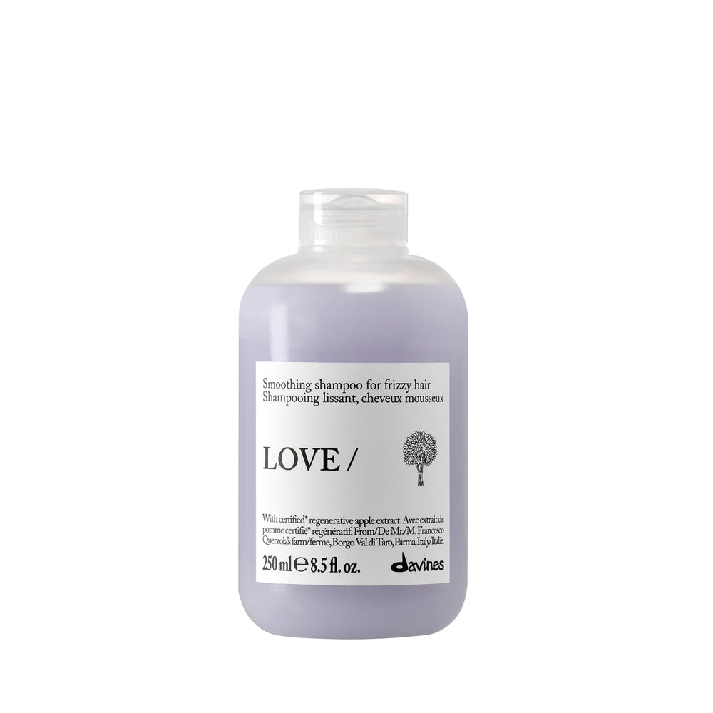 Davines front bottle showing LOVE Smoothing Shampoo benefits and design