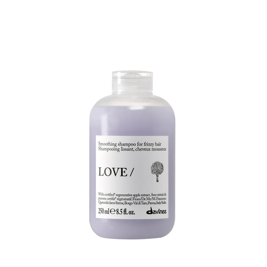 Davines front bottle showing LOVE Smoothing Shampoo benefits and design