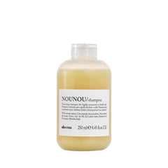 Davines LOVE smoothing shampoo front bottle shows packaging and easy dispensing benefit