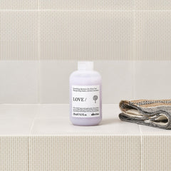 Davines apple pulp ingredient display emphasizing regenerative organic extract