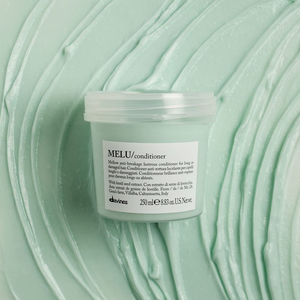 Davines MELU conditioner dispensing a small amount for controlled application