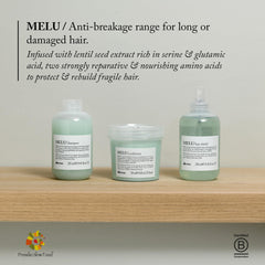 Davines MELU bottle in hand for scale showing travel-friendly size and ease