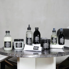 Davines jar placed on bathroom shelf suggesting daily routine integration