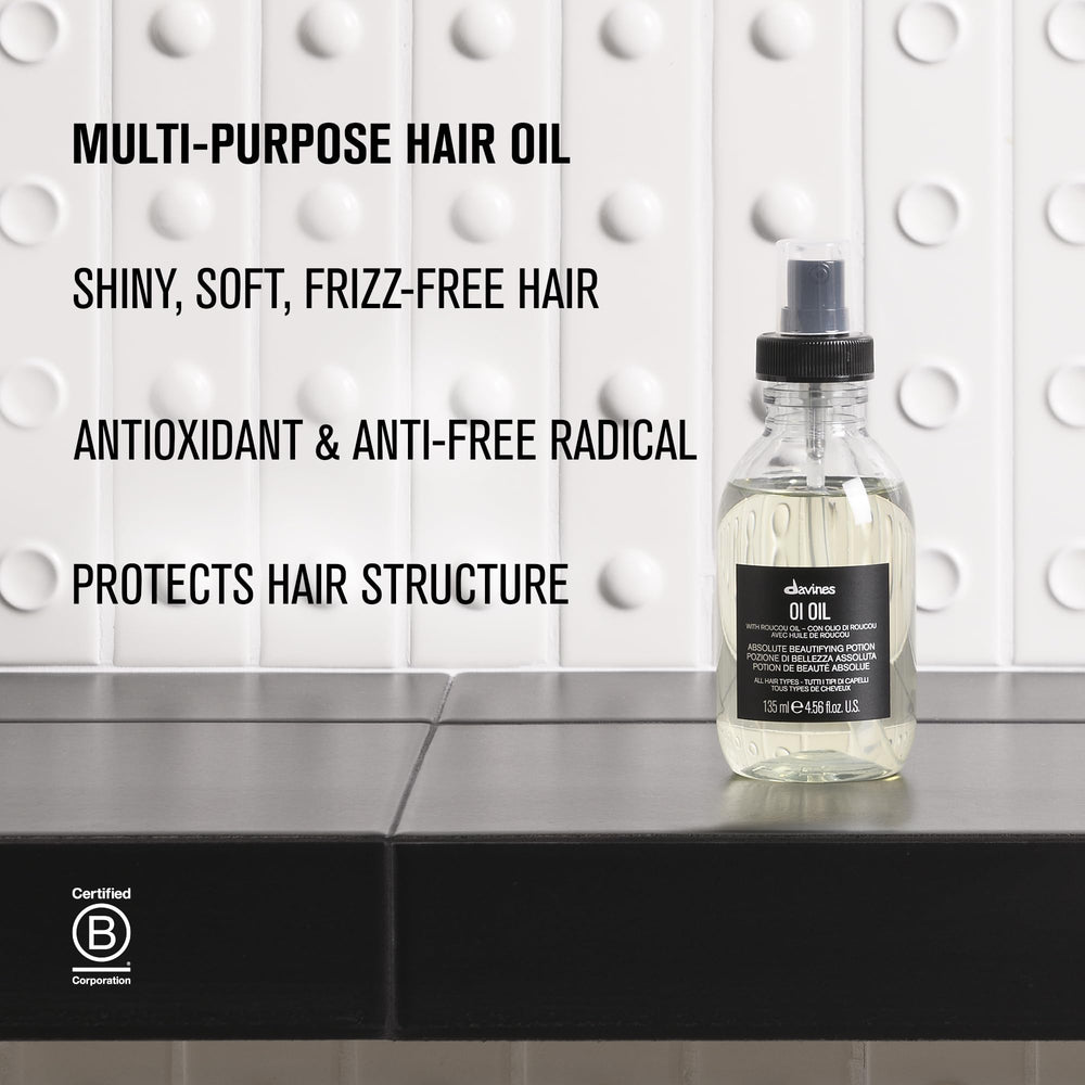 Davines OI Oil next to a ruler showing 4.56 fl oz true size