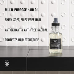 Davines OI Oil next to a ruler showing 4.56 fl oz true size