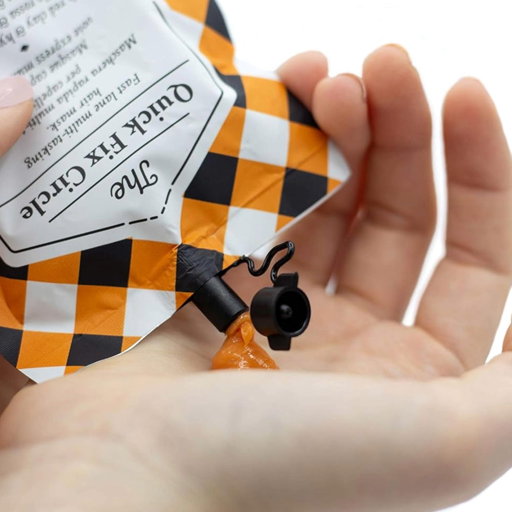 Davines tube next to a passport showing travel-size convenience benefit