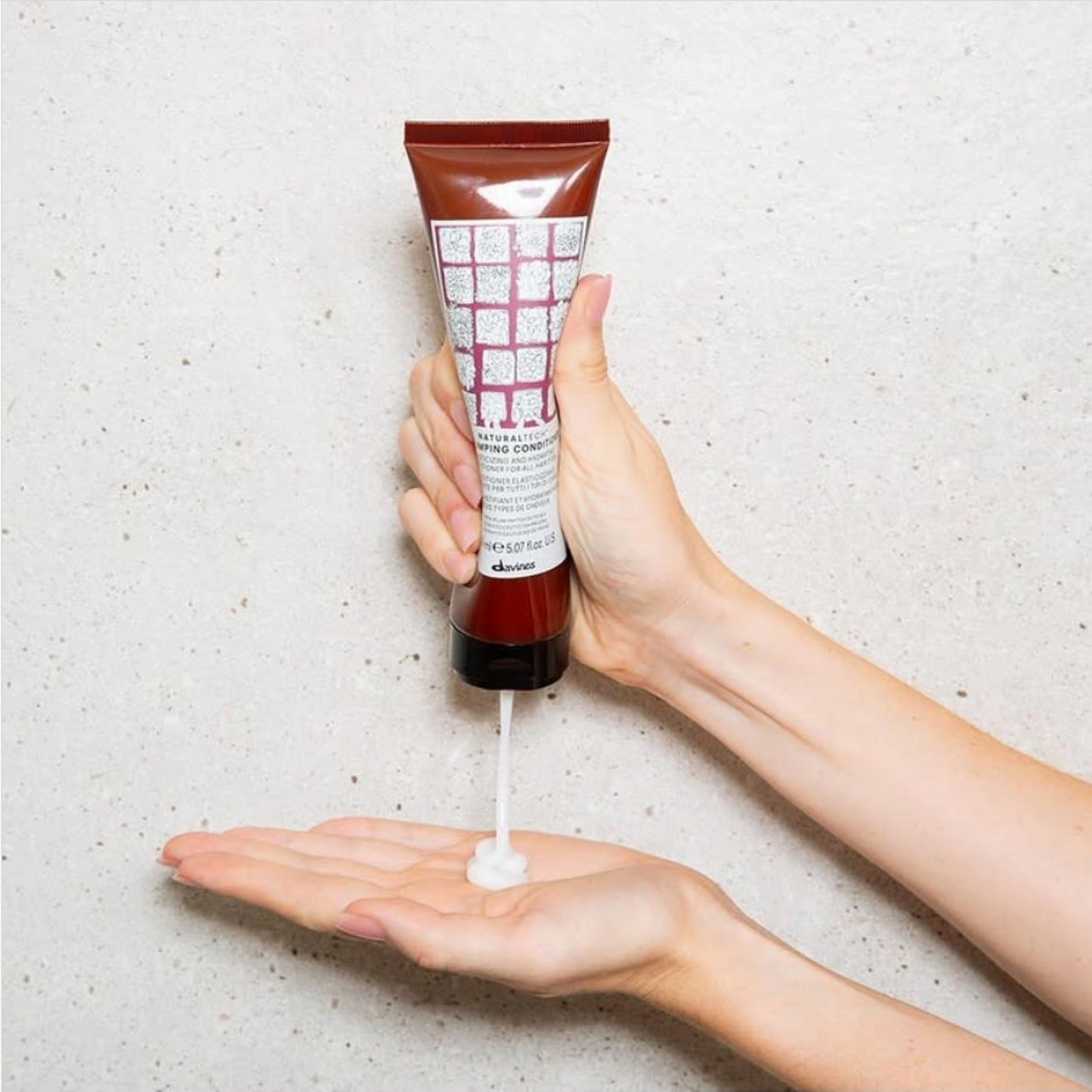 Davines replumping conditioner on vanity lifestyle scene for daily use