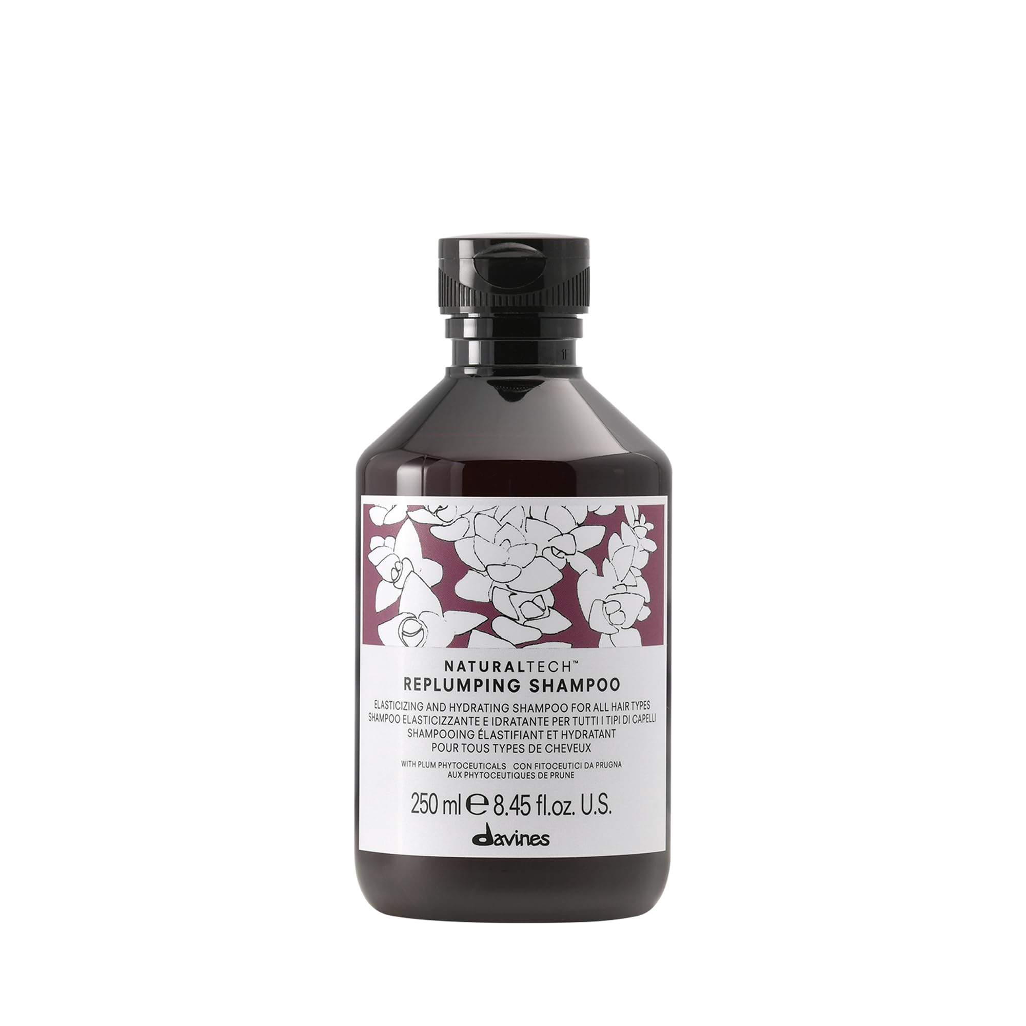 Davines replumping shampoo front bottle shows brand and styling benefit