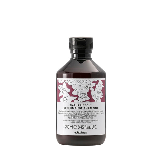 Davines replumping shampoo front bottle shows brand and styling benefit