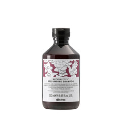 Davines replumping shampoo front bottle shows brand and styling benefit