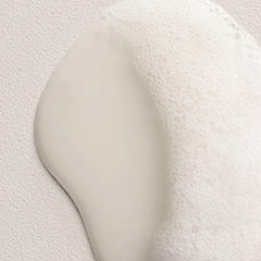 Davines replumping shampoo open cap revealing product consistency and purity benefit