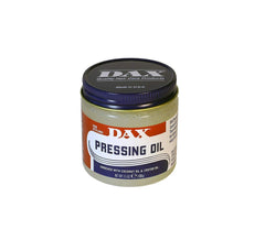 DAX pressing oil bottle front view showing label and travel-size benefit
