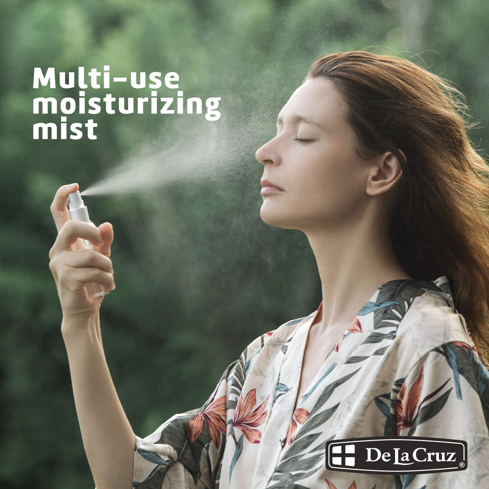 De La Cruz mist applied to hair showing refreshed, softer strands