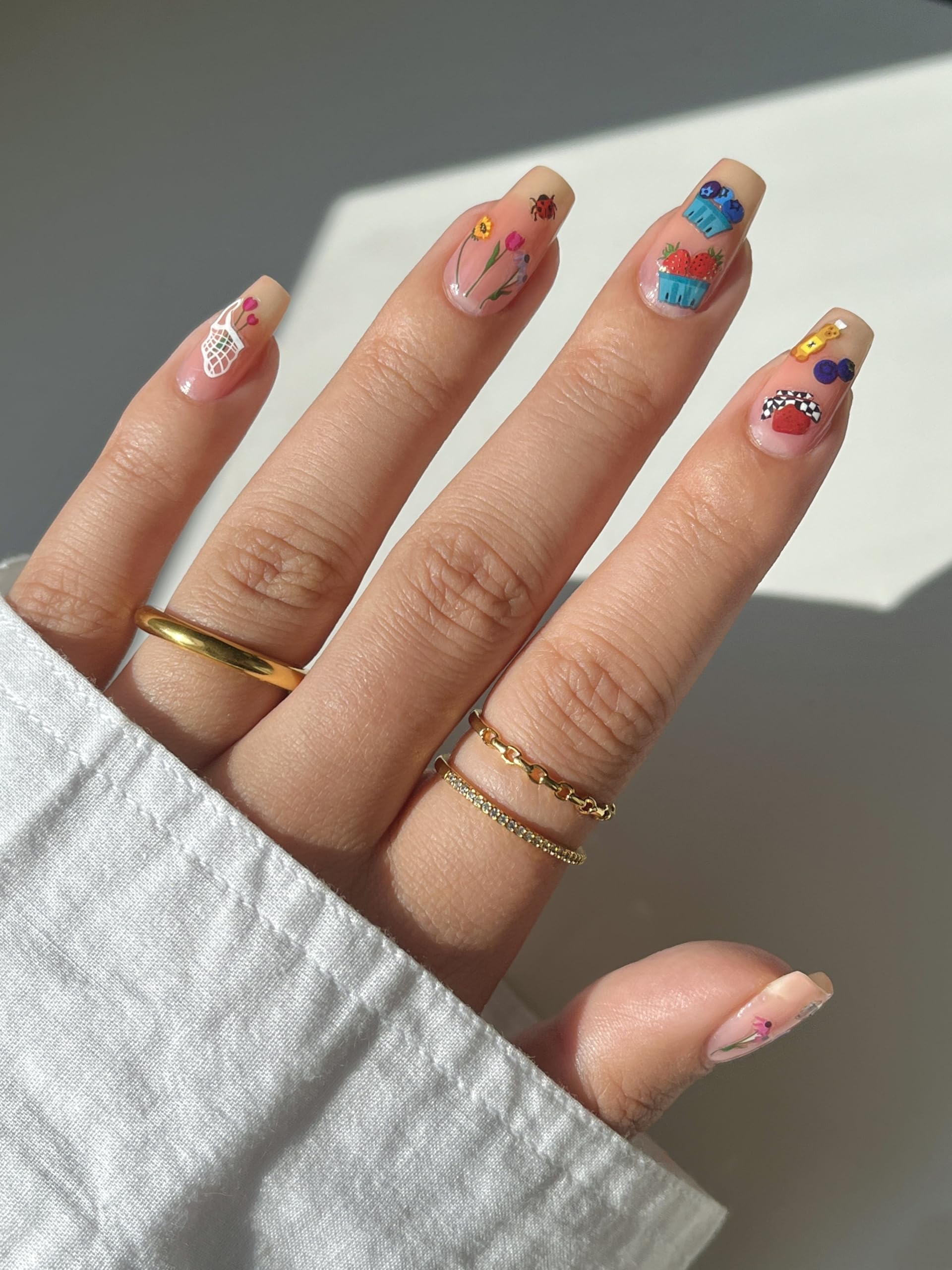 Deco Beauty on-model nails in use showing trendy designs and durability