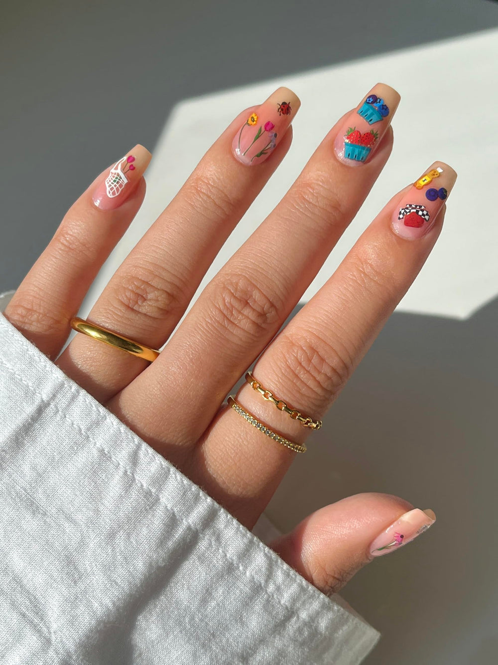Deco Beauty on-model nails in use showing trendy designs and durability