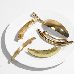 DeD barrettes worn in hair half-up style adding polished vintage flair