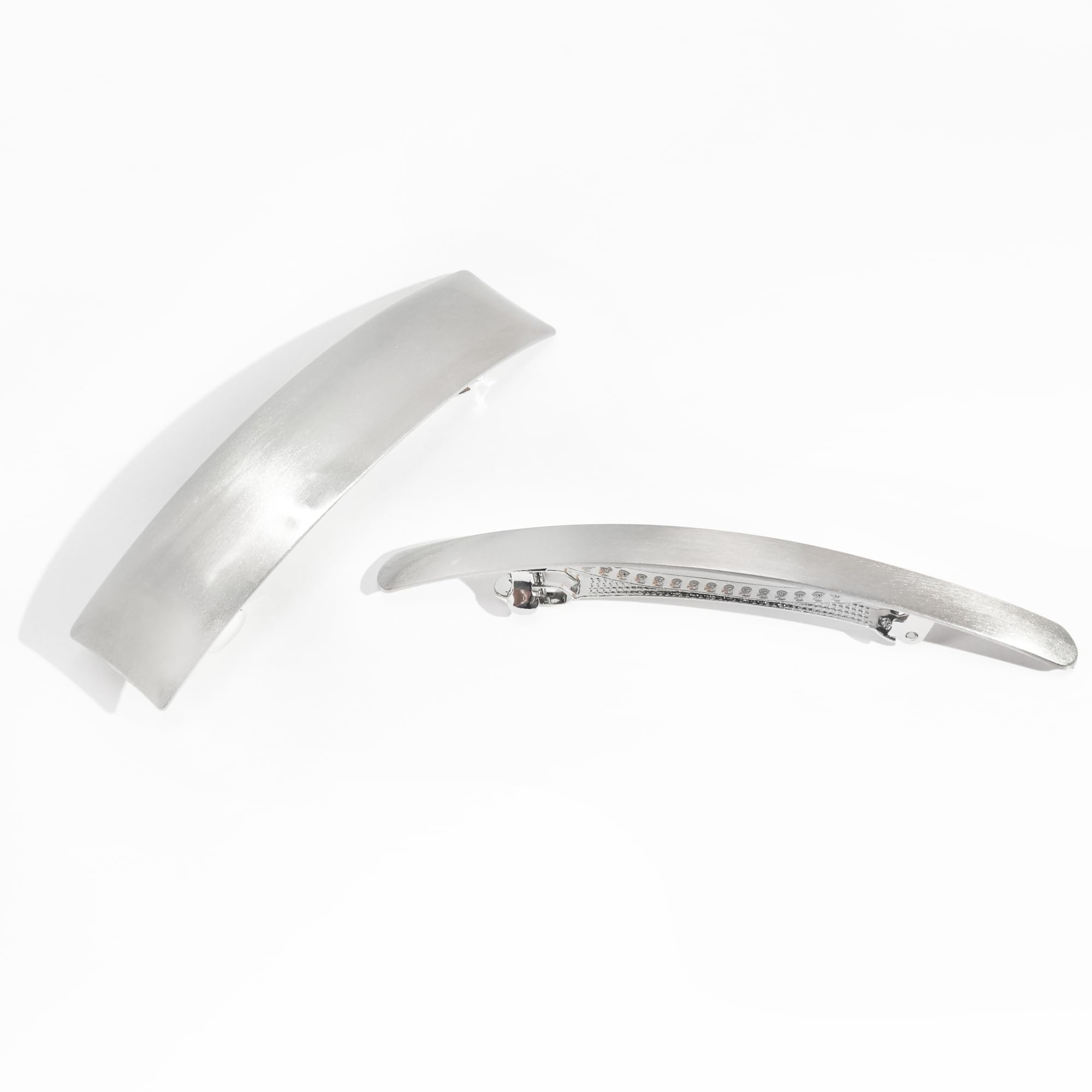 DED clip held in hand to show scale and size for long and medium hair compatibility