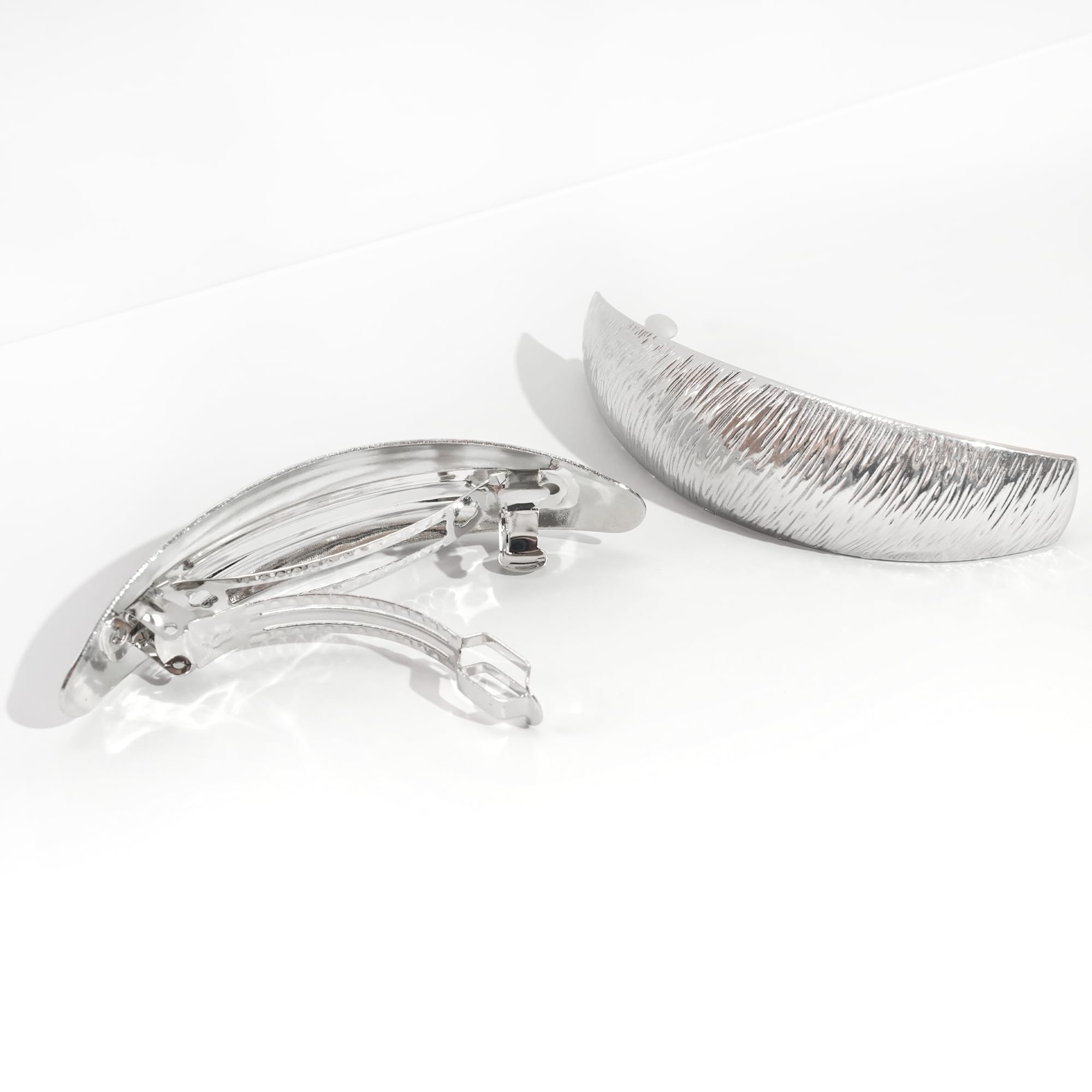 DED lifestyle shot of multiple clips used in an elegant updo for event-ready shine