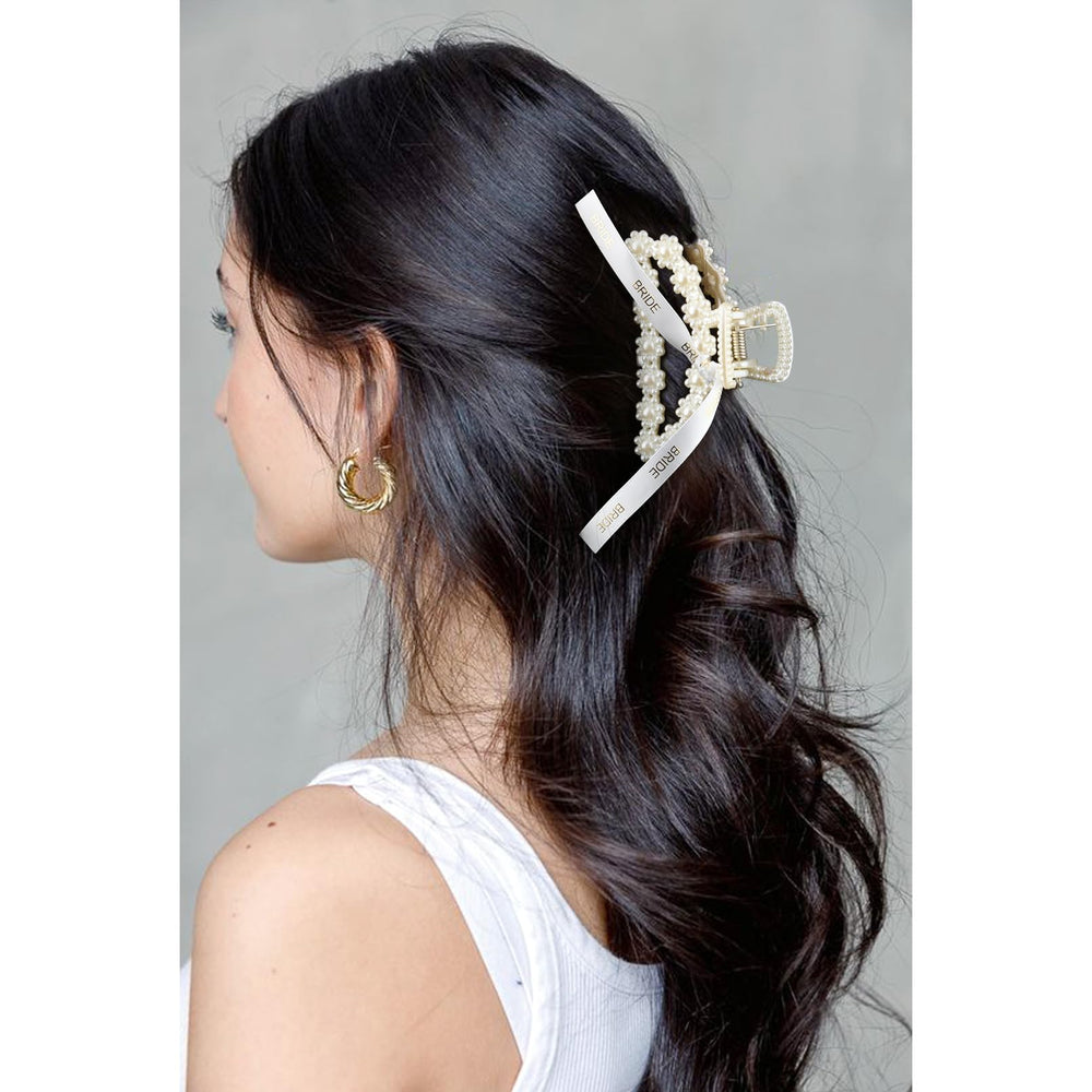DEEKA hair clip holding an updo on model for practical styling and photo-ready benefit