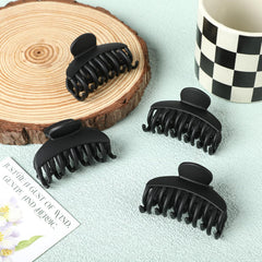 DEEKA clip holding a half-bun, showing secure everyday styling benefit
