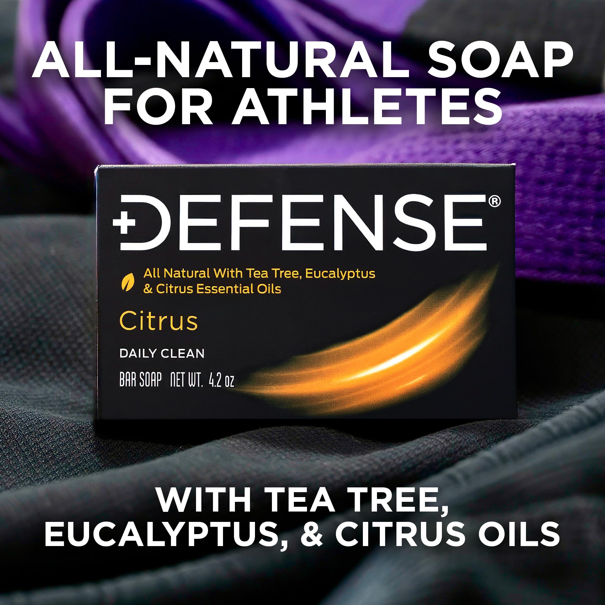 Defense Soap citrus bar in hand showing 4.2 oz scale and portability