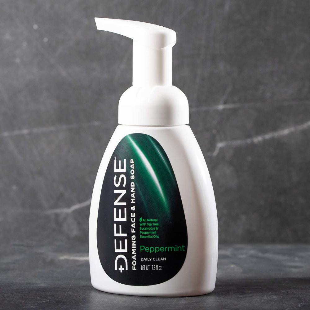 Defense Soap natural ingredient display with oils and aloe for soothing