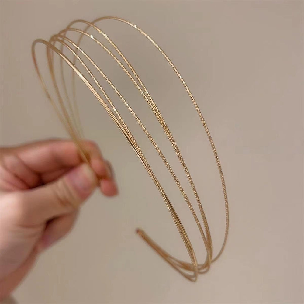 Deghew gold headband close-up detail of metal texture and layered construction for durable shine