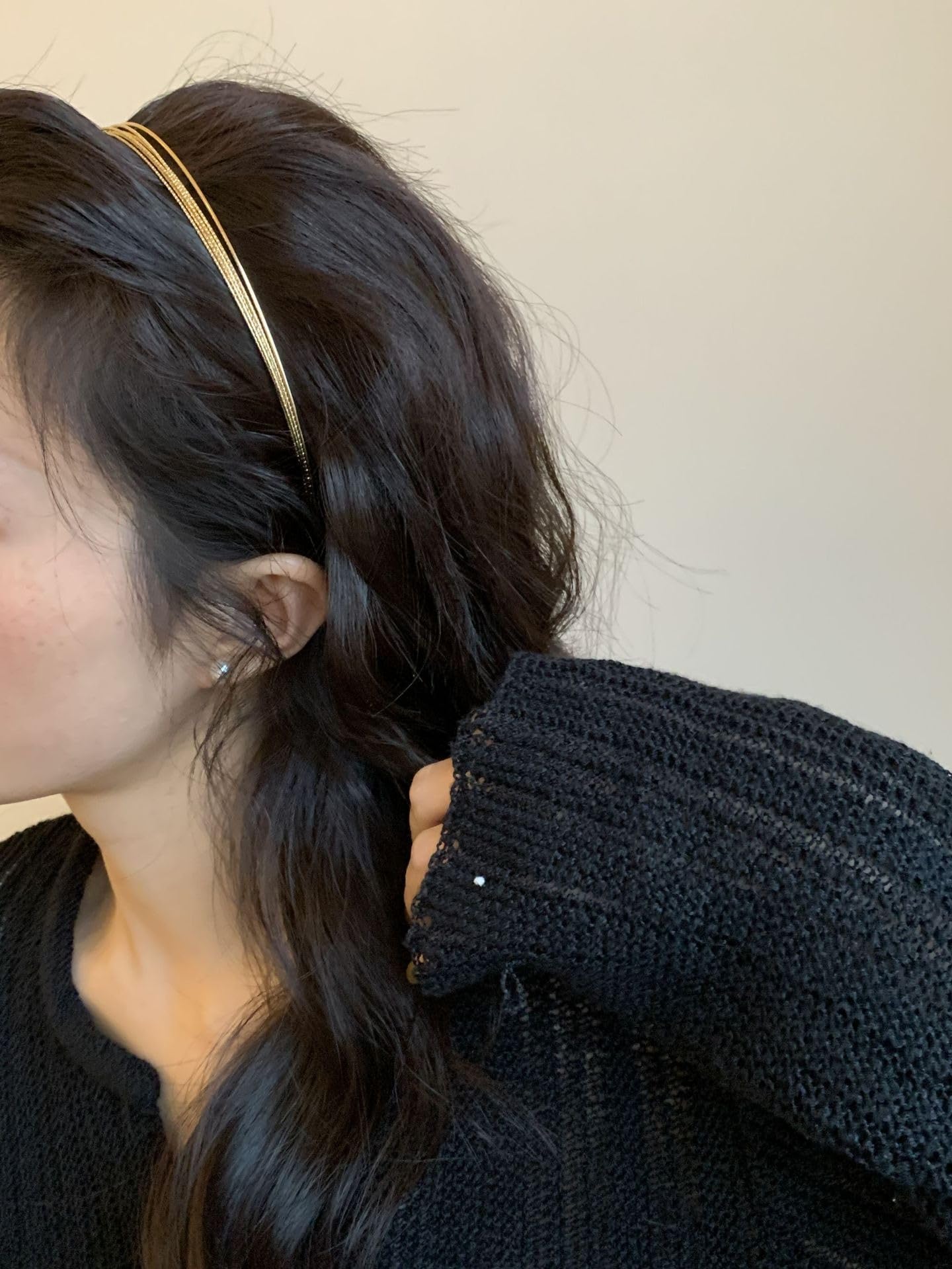 Deghew gold headband styled with outfit on model adding subtle metallic accent for special occasions