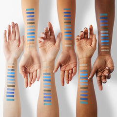 DE'LANCI arm swatches of fifteen shades showing pigmentation and blendability