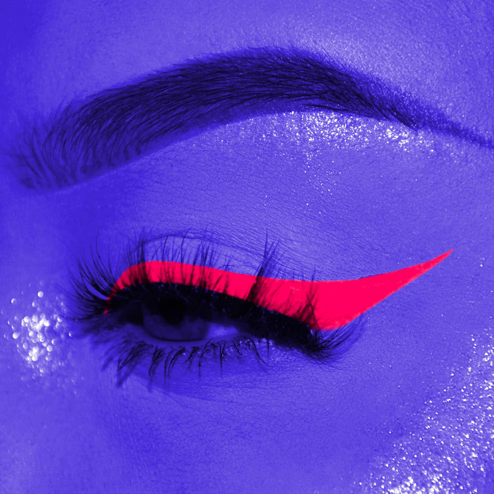 DELISOUL neon pink swatch on arm showing strong pigment payoff