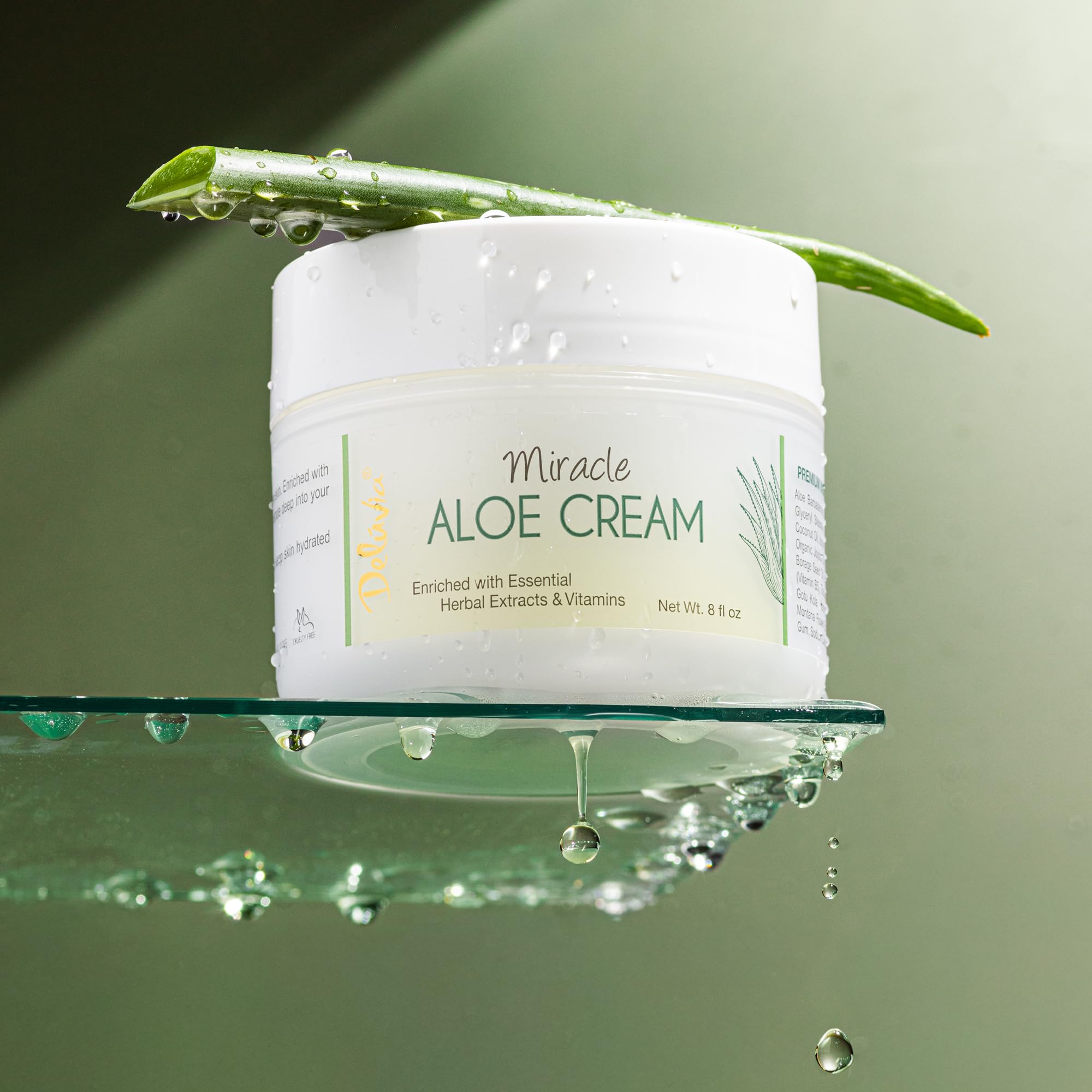 Hand applying DELÚVIA to dry skin to restore moisture quickly