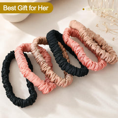 DEMAZALO silk scrunchies arranged in a gift box, ready to present
