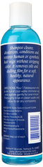 Demert shampoo in use washing a wig on a stand to restore natural look and remove oils