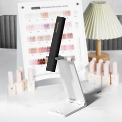 Denabuty curing nails with rhinestones to demonstrate precise nail-art support benefit