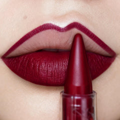 Depuplum burgundy combo front view showing product and benefit of portable single-pencil application