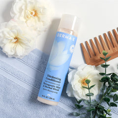 Derma E conditioner being applied to wet hair showing detangling benefit