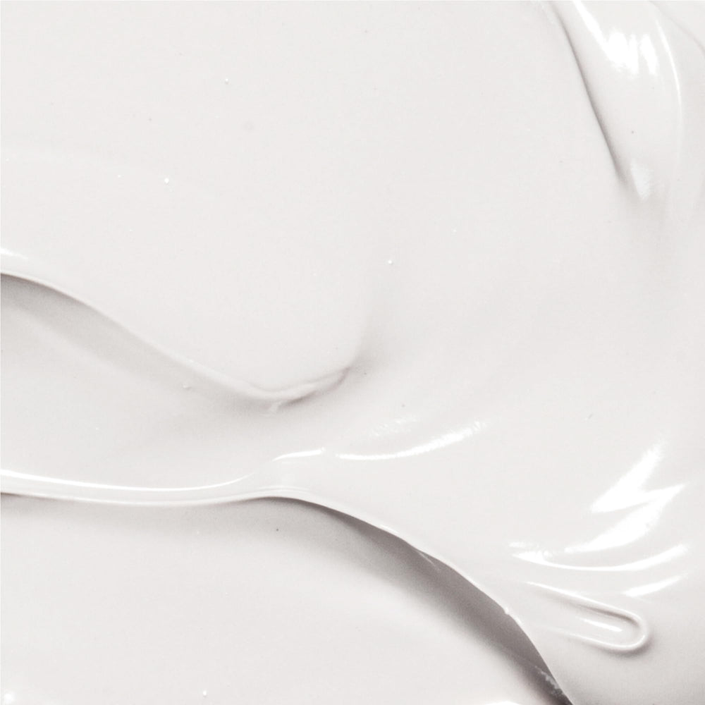 Derma E ingredient label close-up showing natural and vegan formula