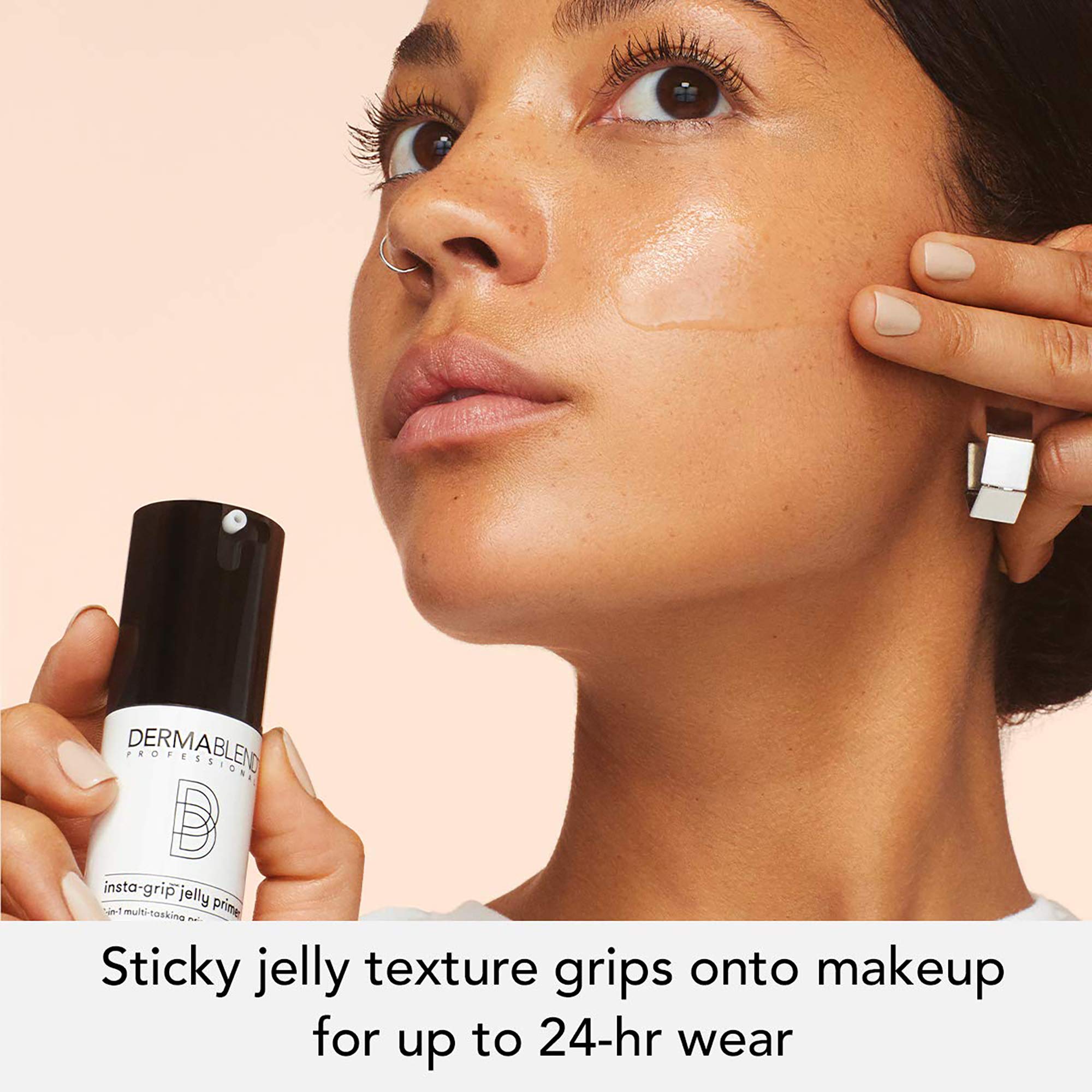 Dermablend applying jelly with fingertips to prep skin and lock makeup